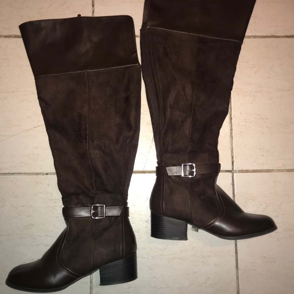 Like new Torrid brown thigh high boots.